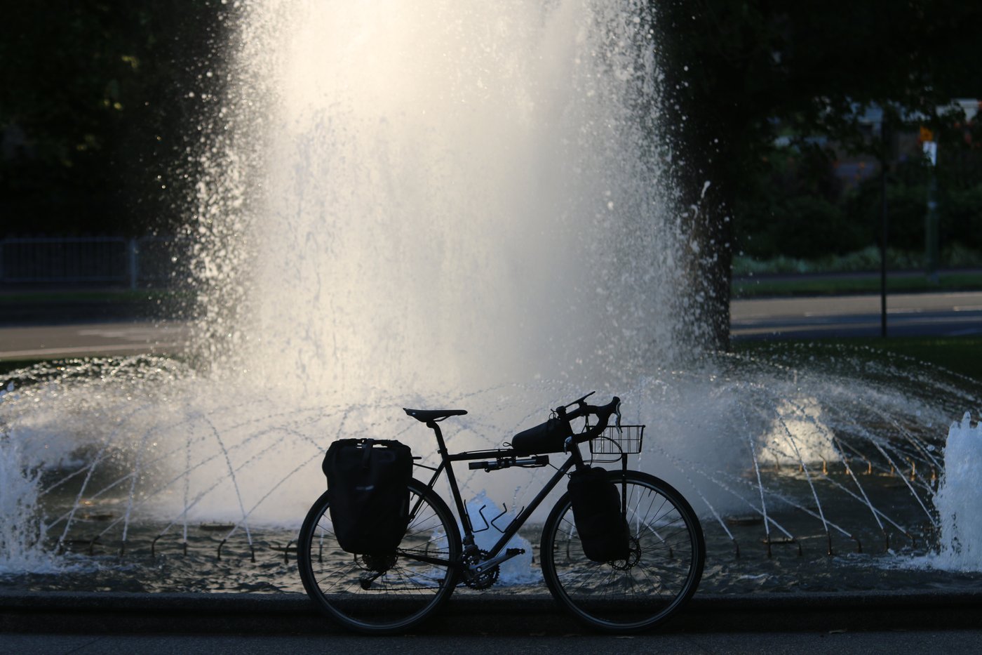 My bike with its new basket lent against a foutain in Melbourne