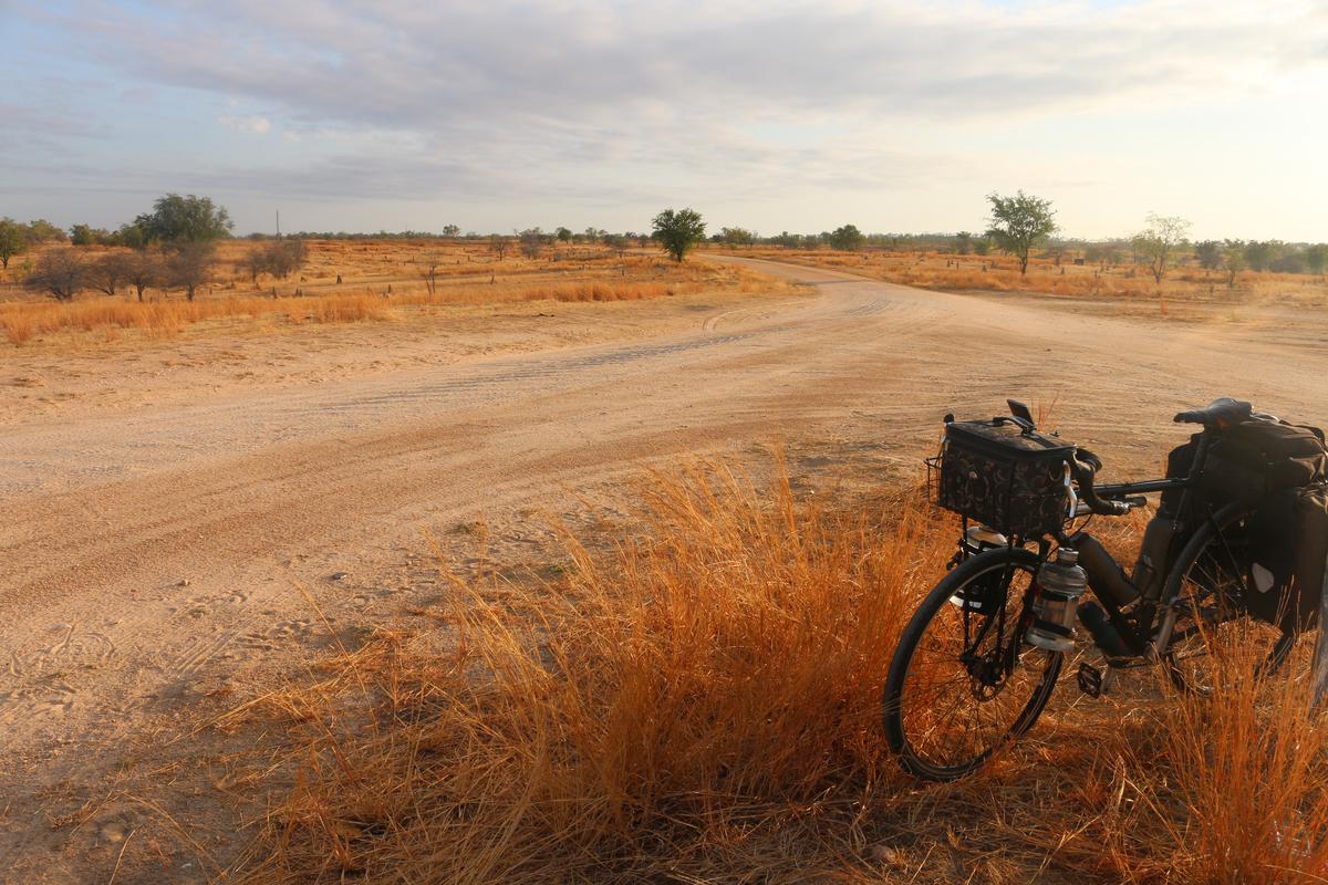 My bike propped upright in the dry outback, Australia