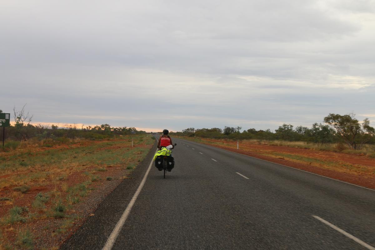 Anna cycling ahead of me in the Northern Territory