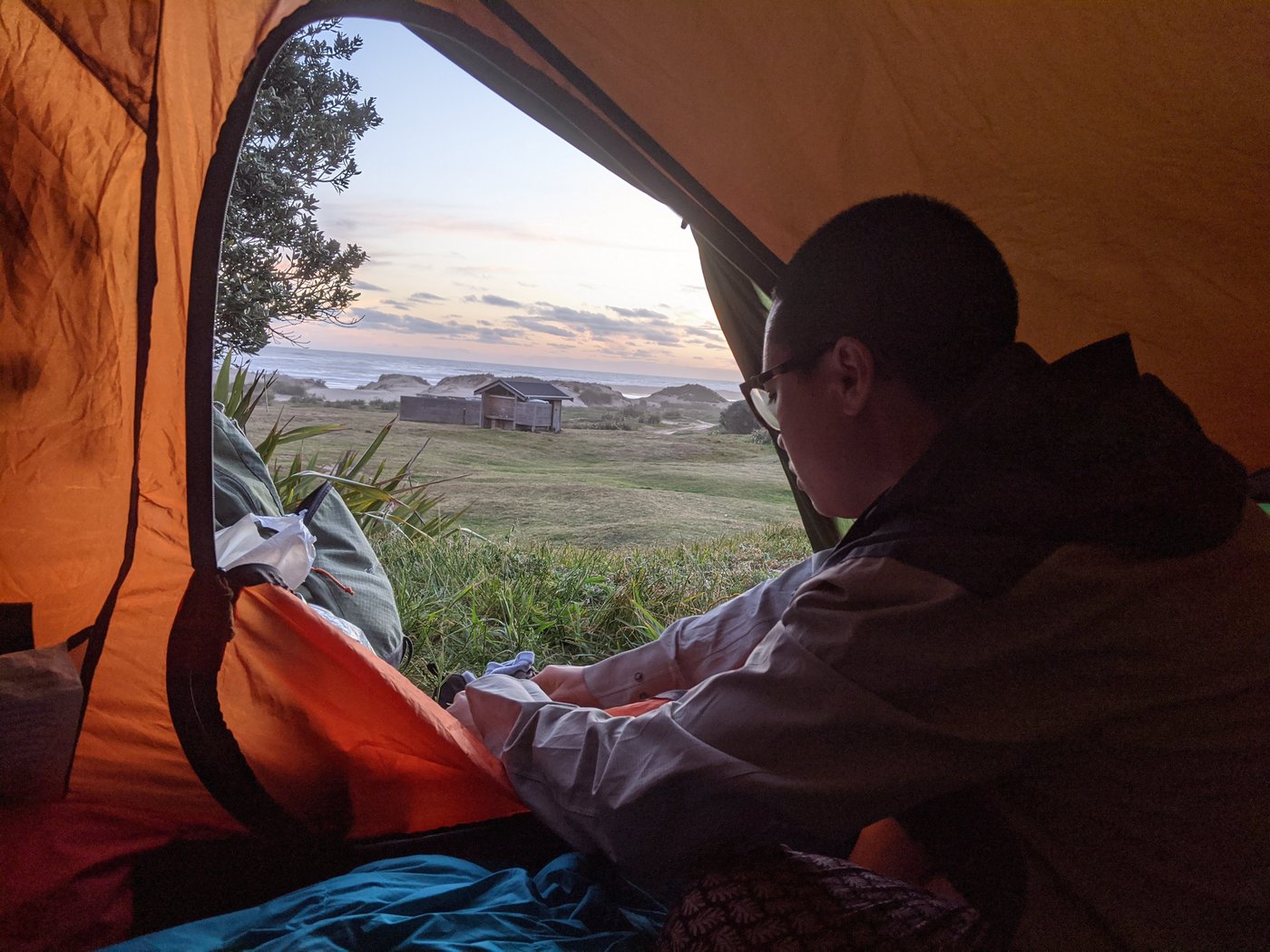 Cooking dinner in the vestibule of the tent after walking 38 kilometres.