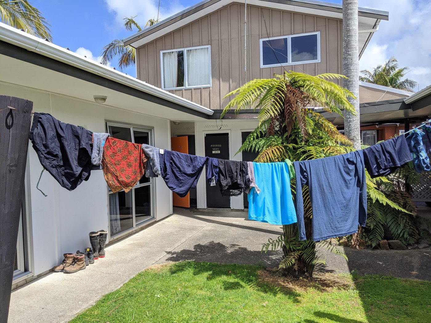 Our hand washed clothes hanging on a line at the hostel.