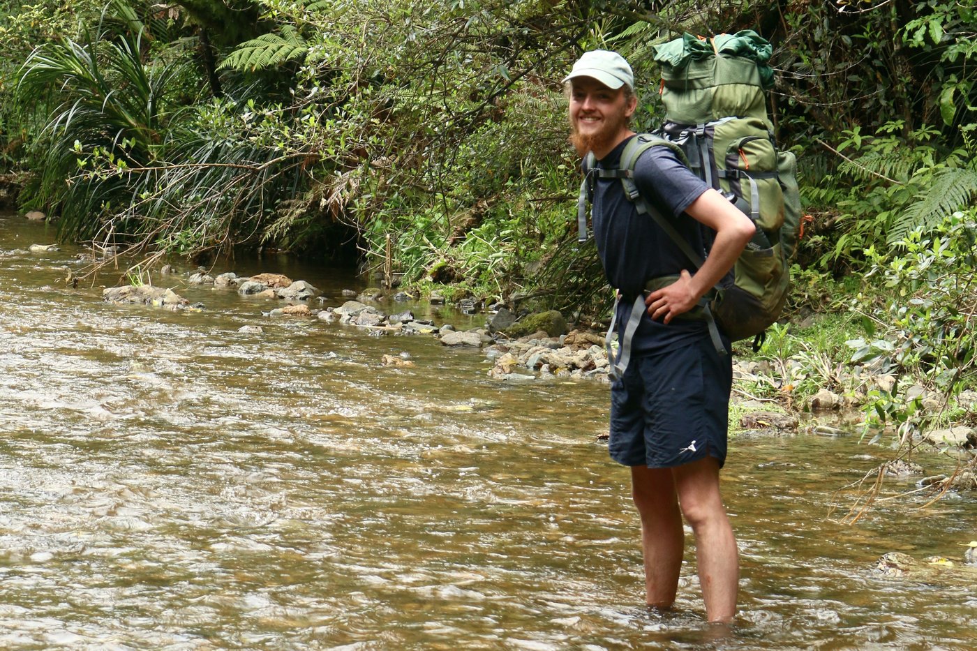 Me standing in the Mangapa river, smiling.