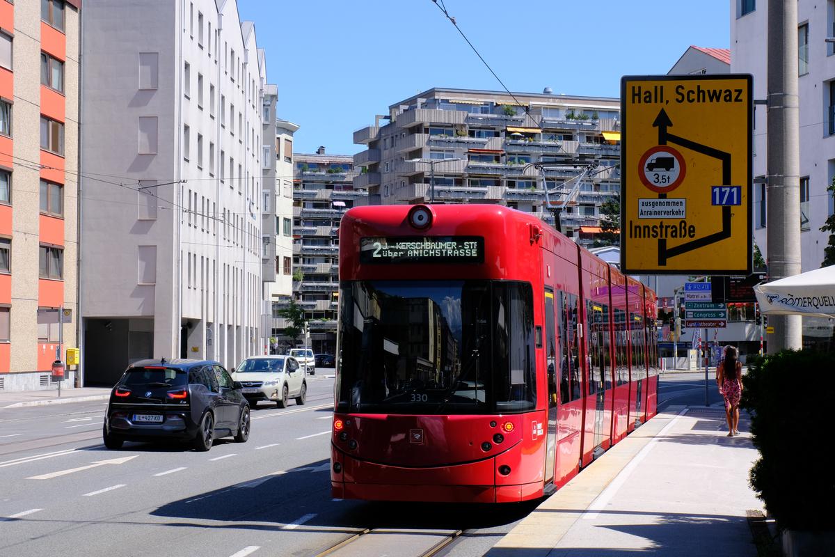 A bright red tram in Innsbruck, Austria