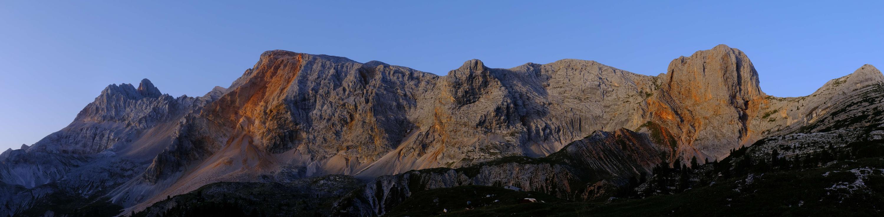 A panorama of a mountain ridge in the early morning light, Dolomites, Italy