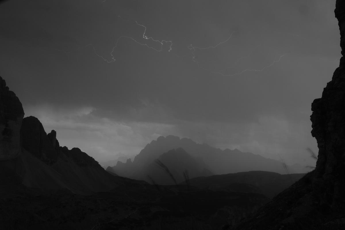 A lucky photo of a horizontal lightning bolt as a storm approaches Tre Cime di Lavaredo, Italy