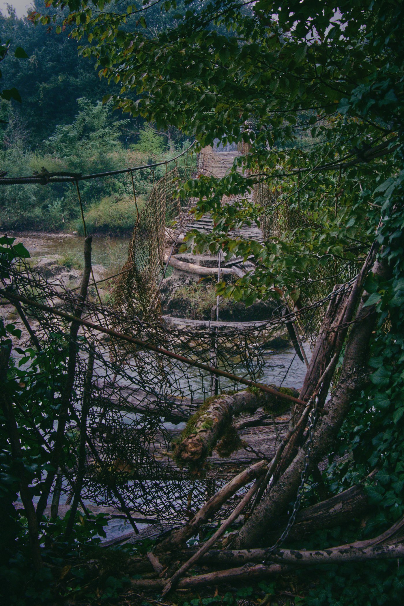 A long abandoned bridge over the Kupa river at the border between Slovenia and Croatia