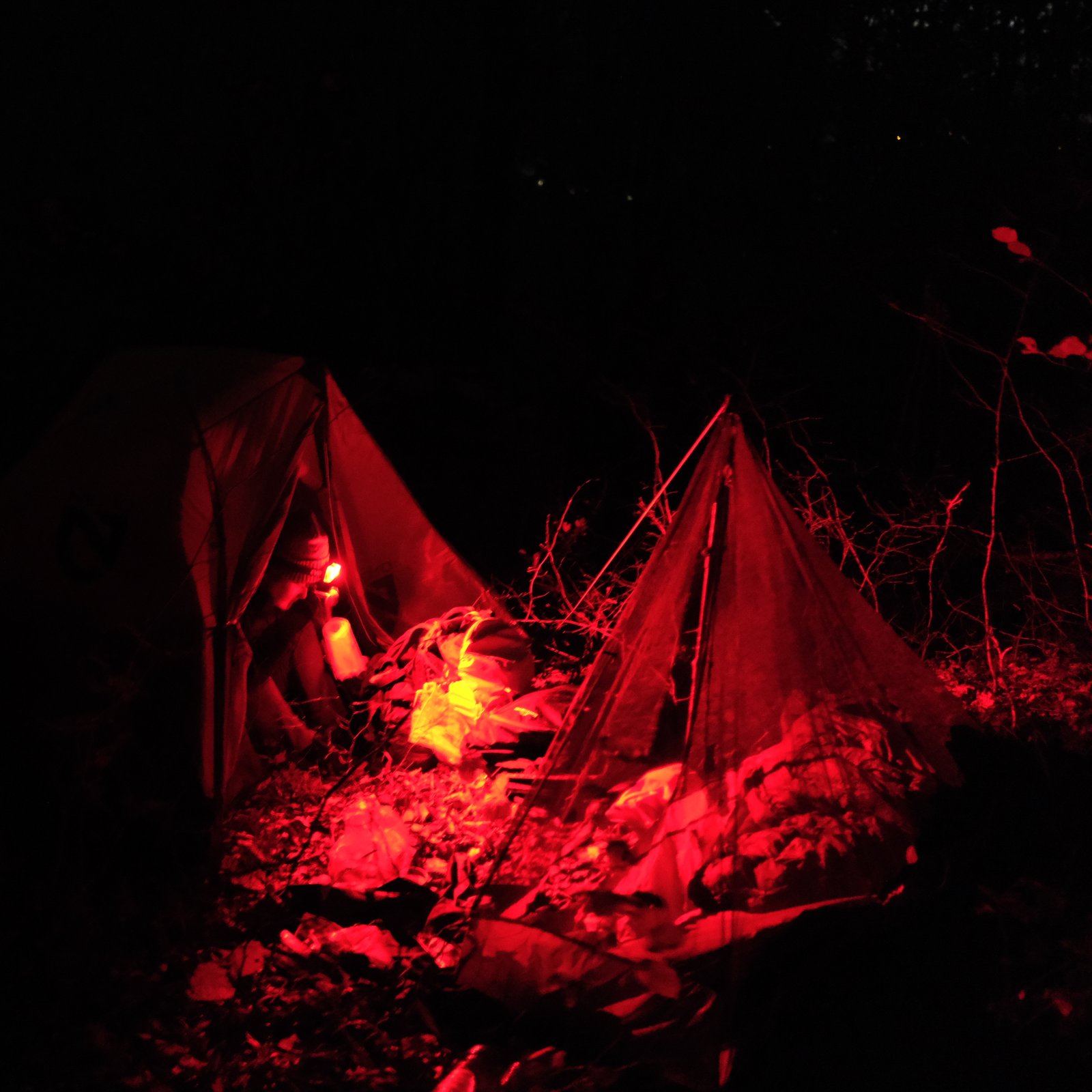 Mizuki sat preparing food from inside her tent just after we crossed the border into Albania