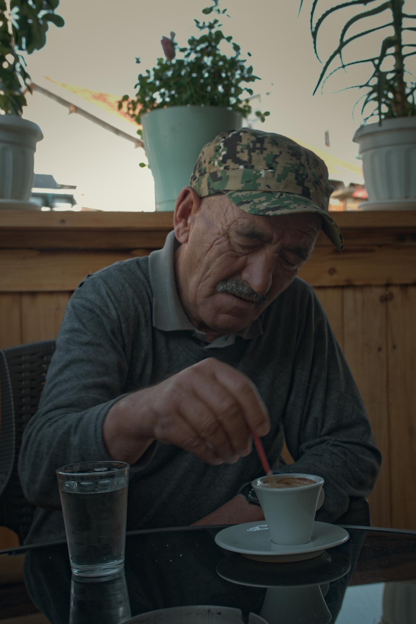 A not-yet-sober man invited me for kafe first thing in the morning. Gjakova, Kosovo