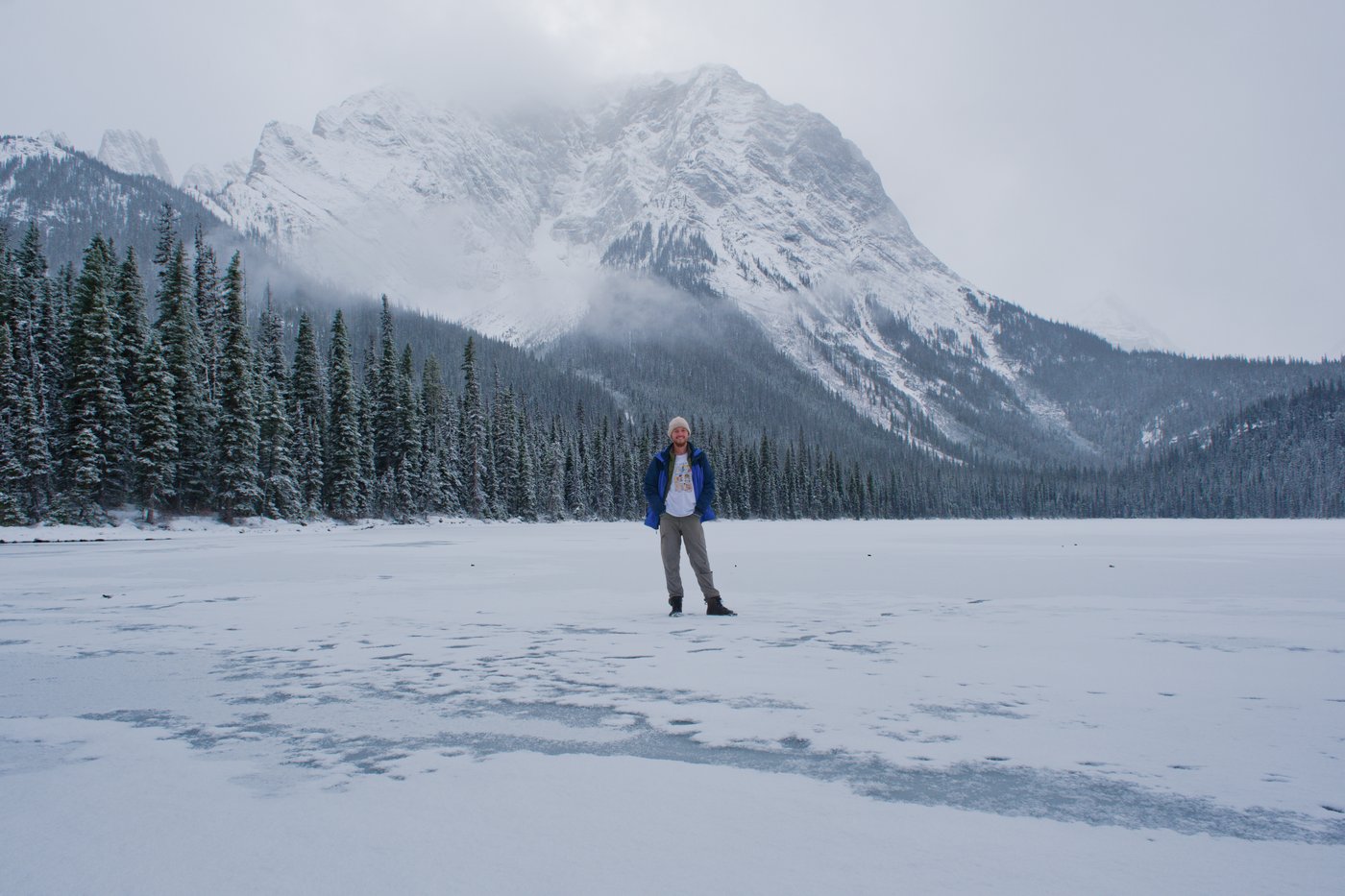 Standing on the frozen lower Elk Lake, Kananaskis, Canada