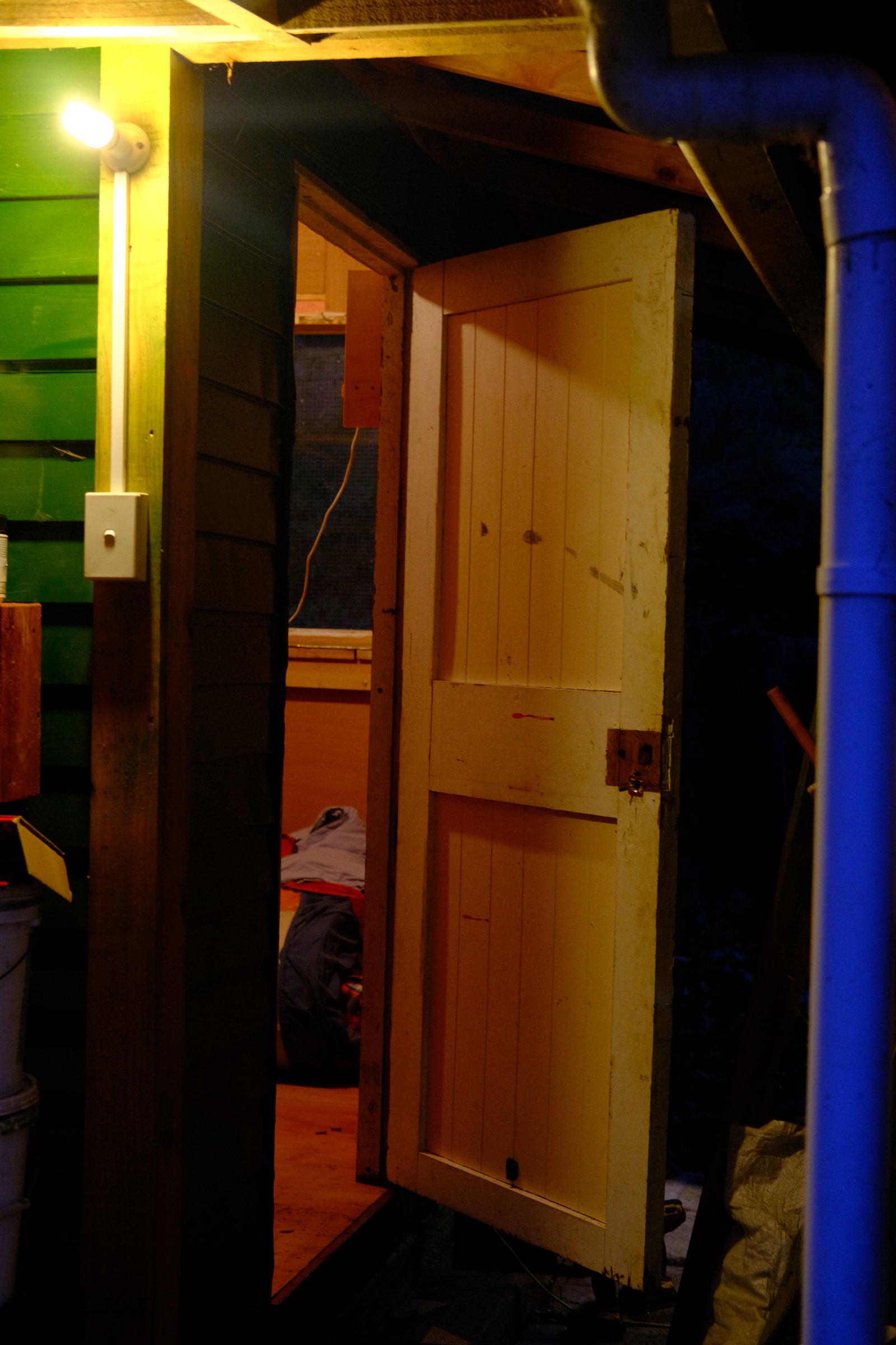 The door (at last) swings outwards late into the evening.