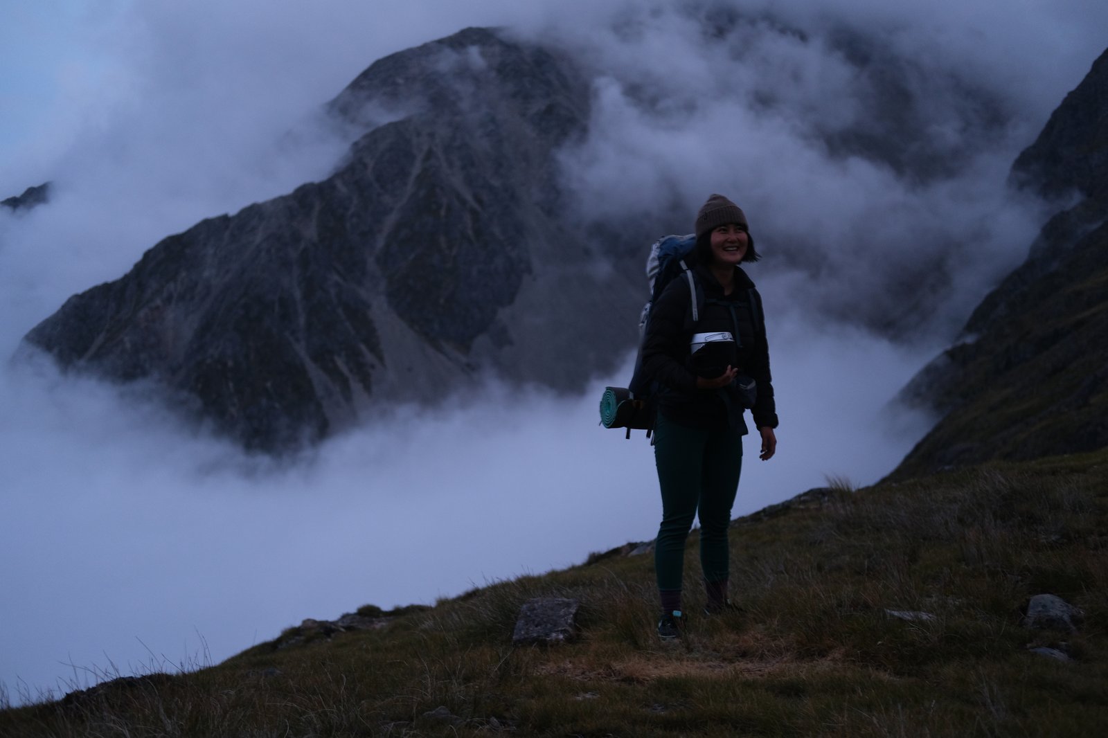 Mizuki holding our dinner while I relocated the tent.