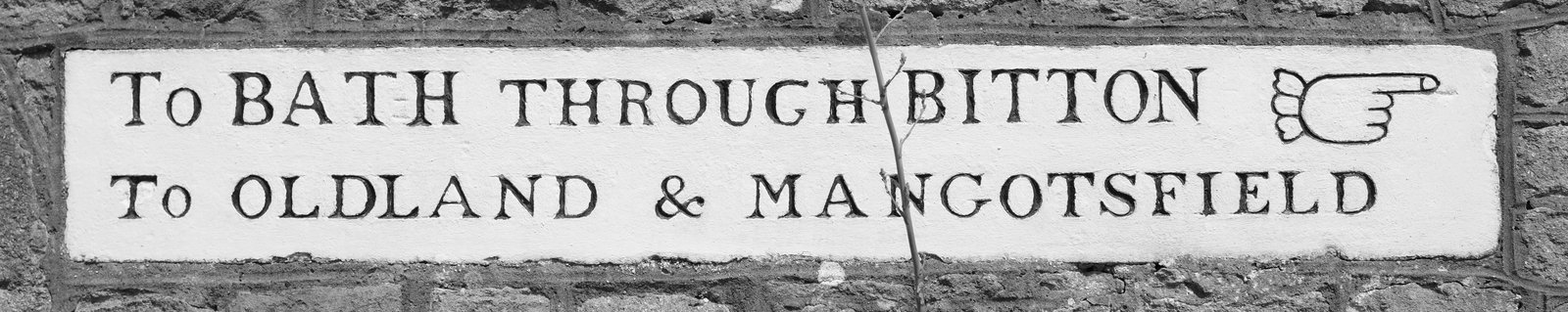 A sign points to Bath