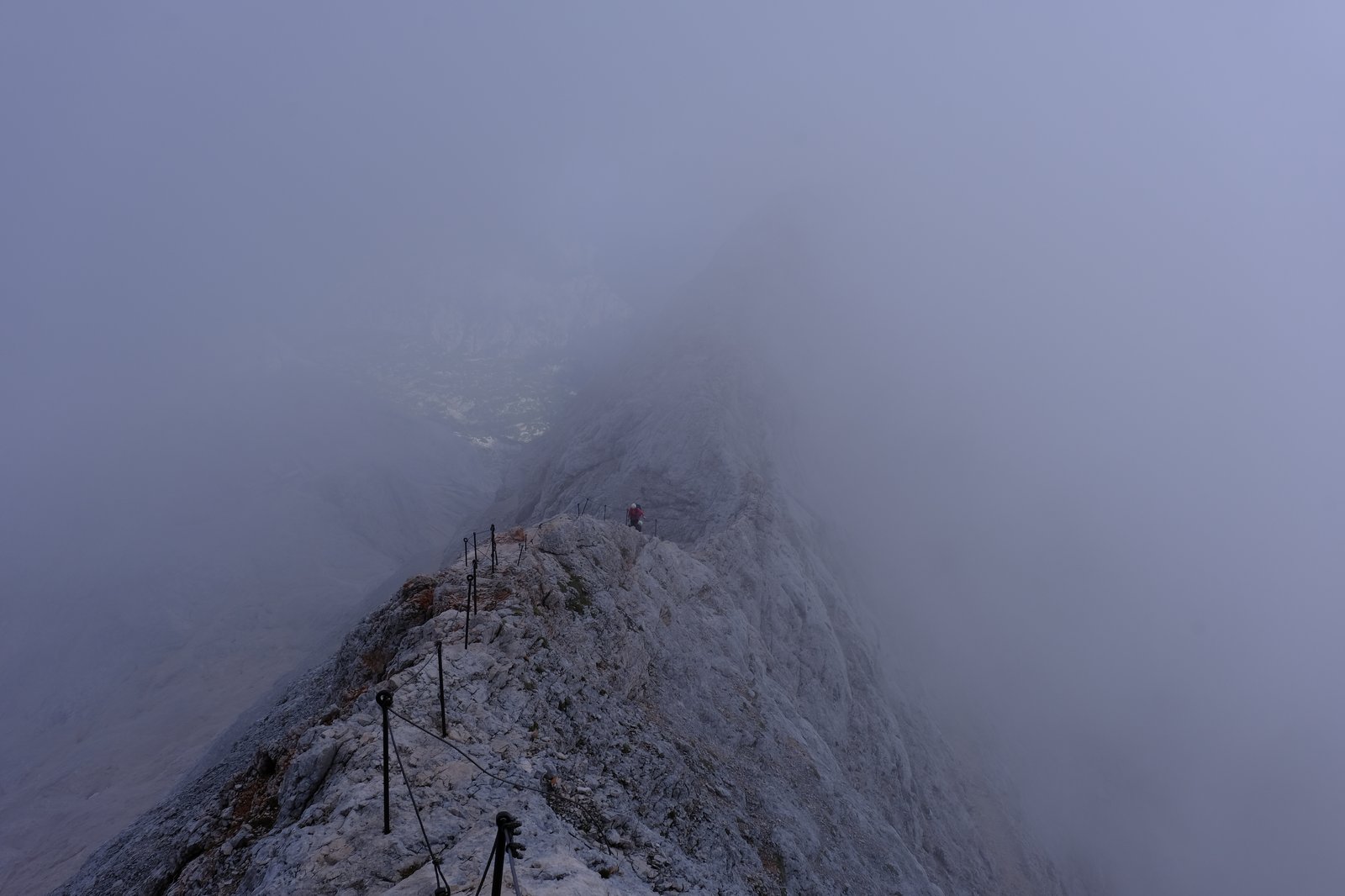 A lone climber on Mount Triglav's eastern ridge. Slovenia 
