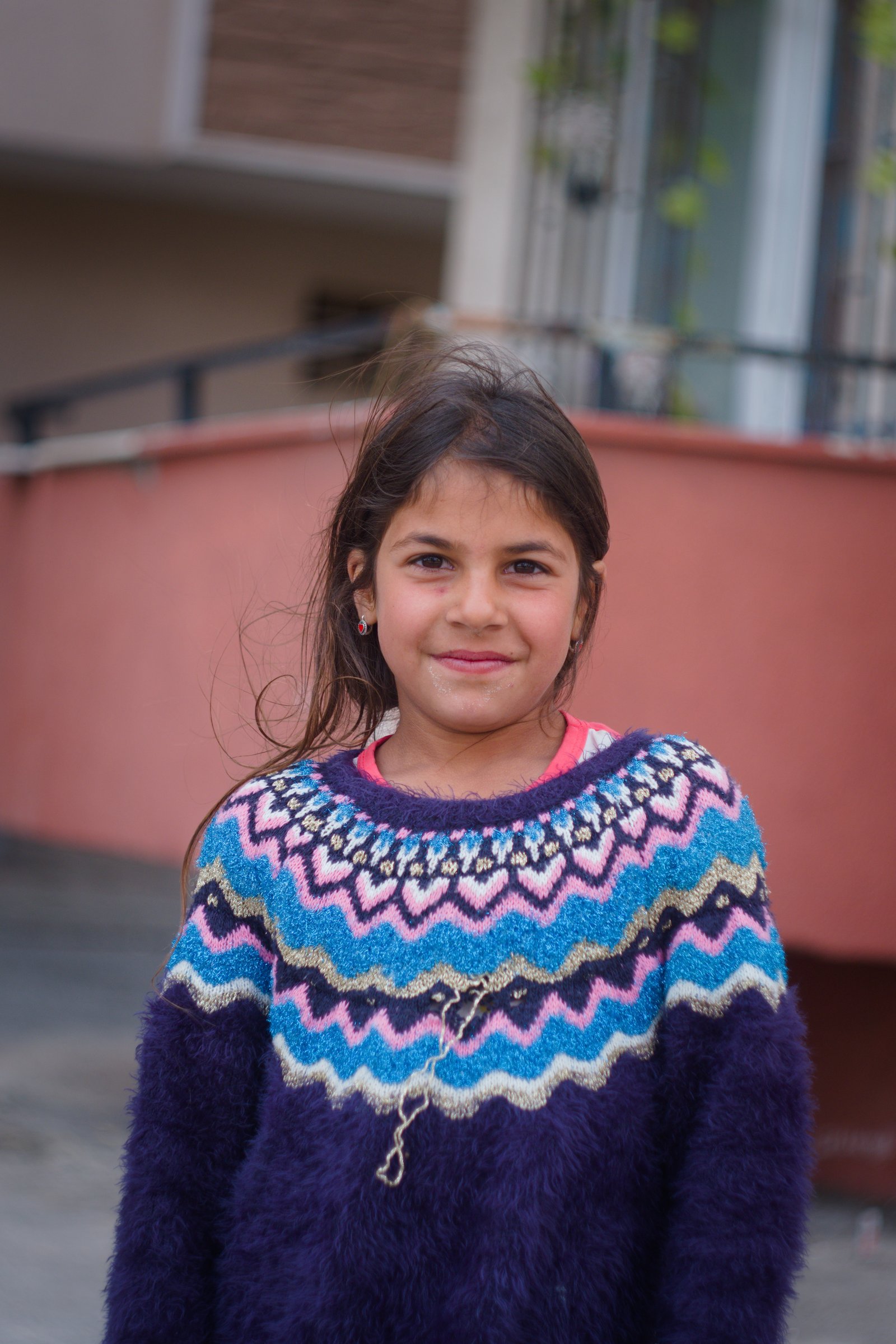 Günseli all of a sudden seemed shy after insisting I take her 'fotograf', outside Istanbul, Turkey