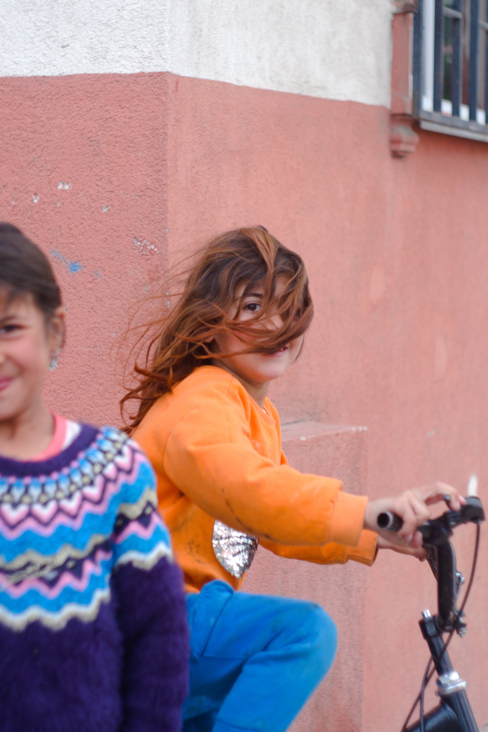 Günseli falls out of focus in the foreground as I try and catch her unnamed friend with a quick manual focus. Outside Istanbul, Turkey