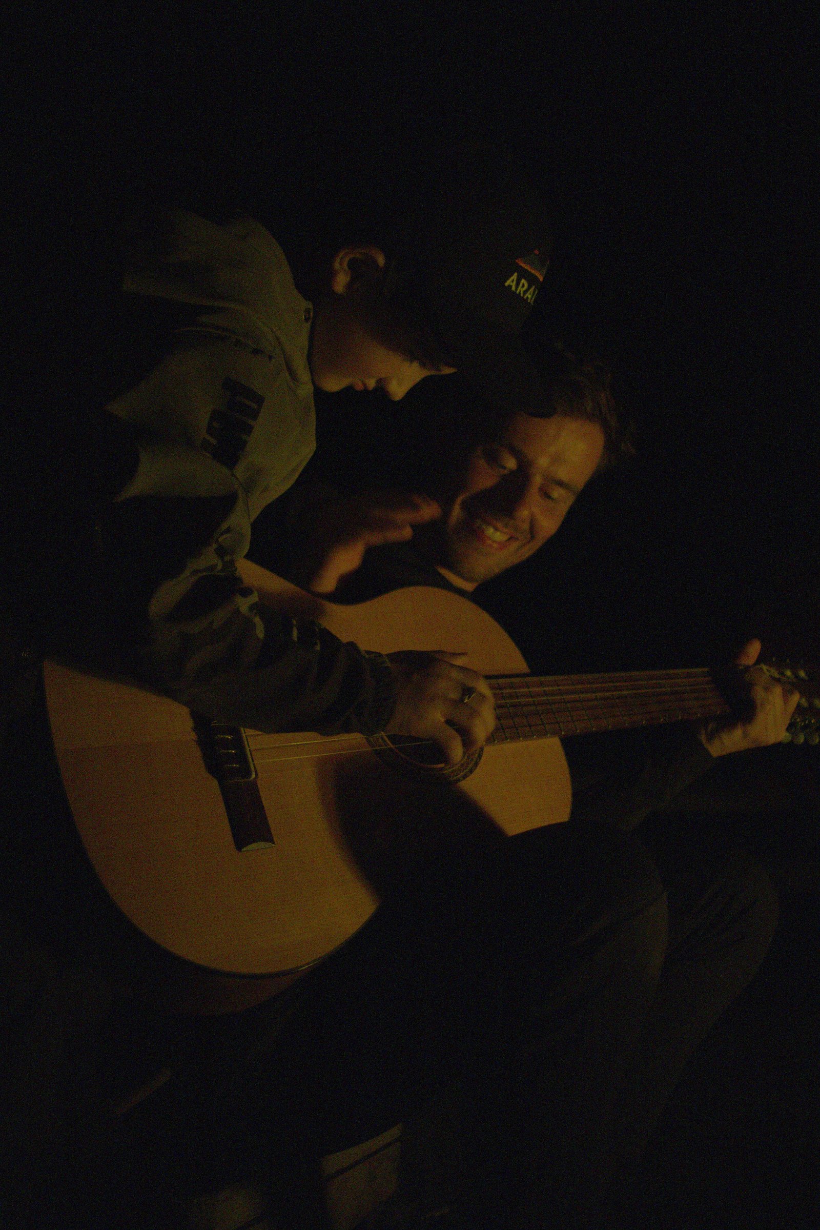 Jonny handles the frets while guiding Samvel in the strumming. Armenia