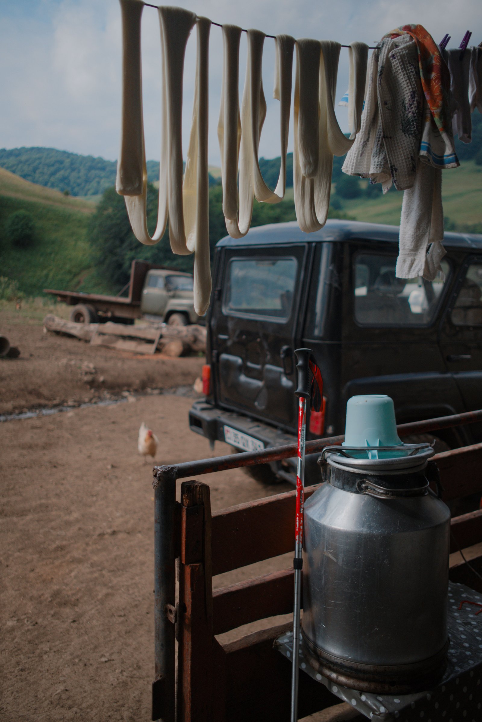 Fresh cheese hangs from a line straight after being pulled form the vat. Armenia