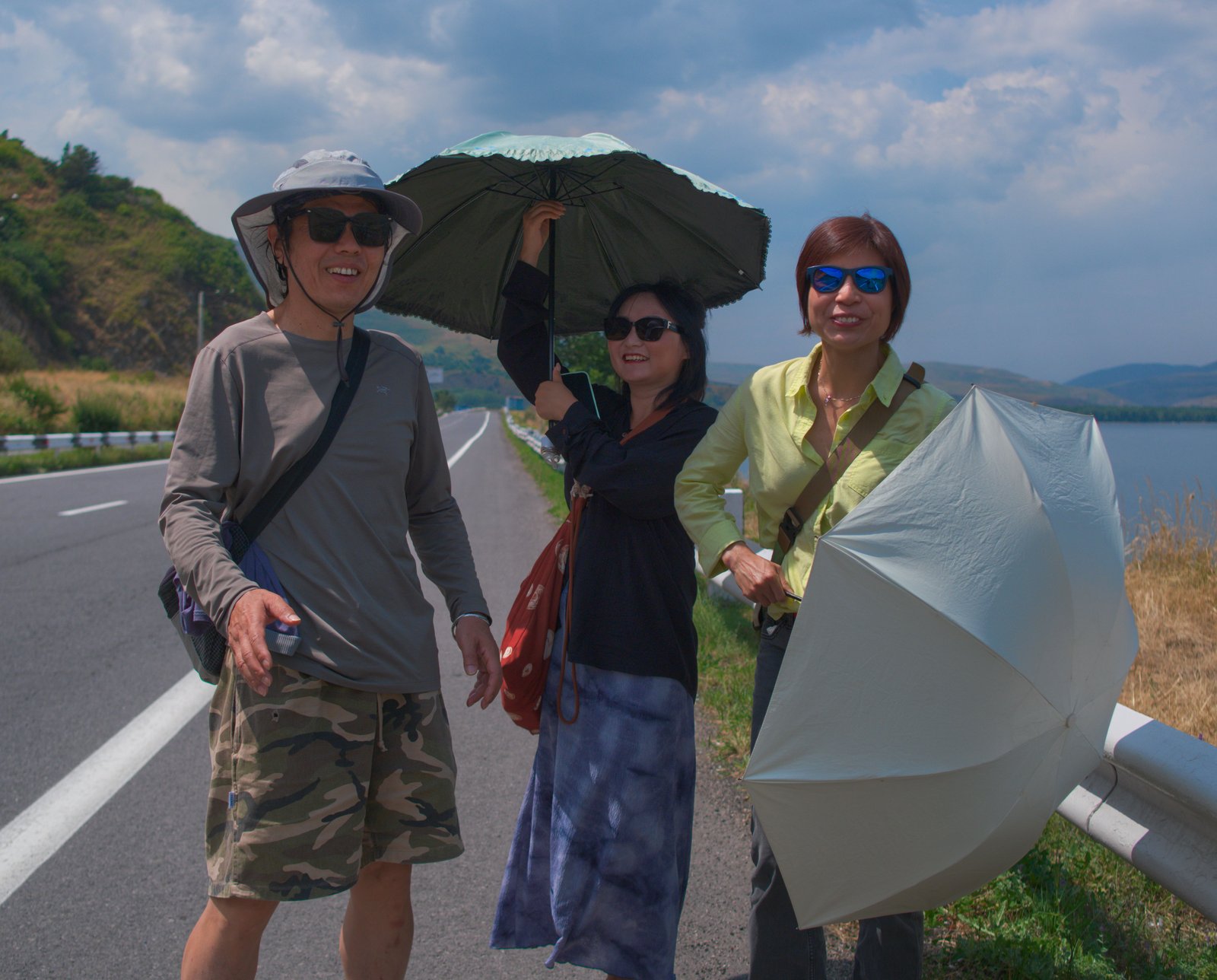 The cheerful family I met on the highway besides Lake Sevan. We took a few posed photographs together at their request but this candid, taken as we said goodbye, was my favourite, showing some of their very memorable joy. Lake Sevan, Armenia