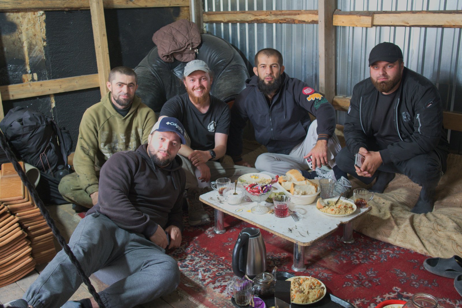 In the village of Khamamatyurt a group of cage fighters invited me in for food. Chechnya, Russia