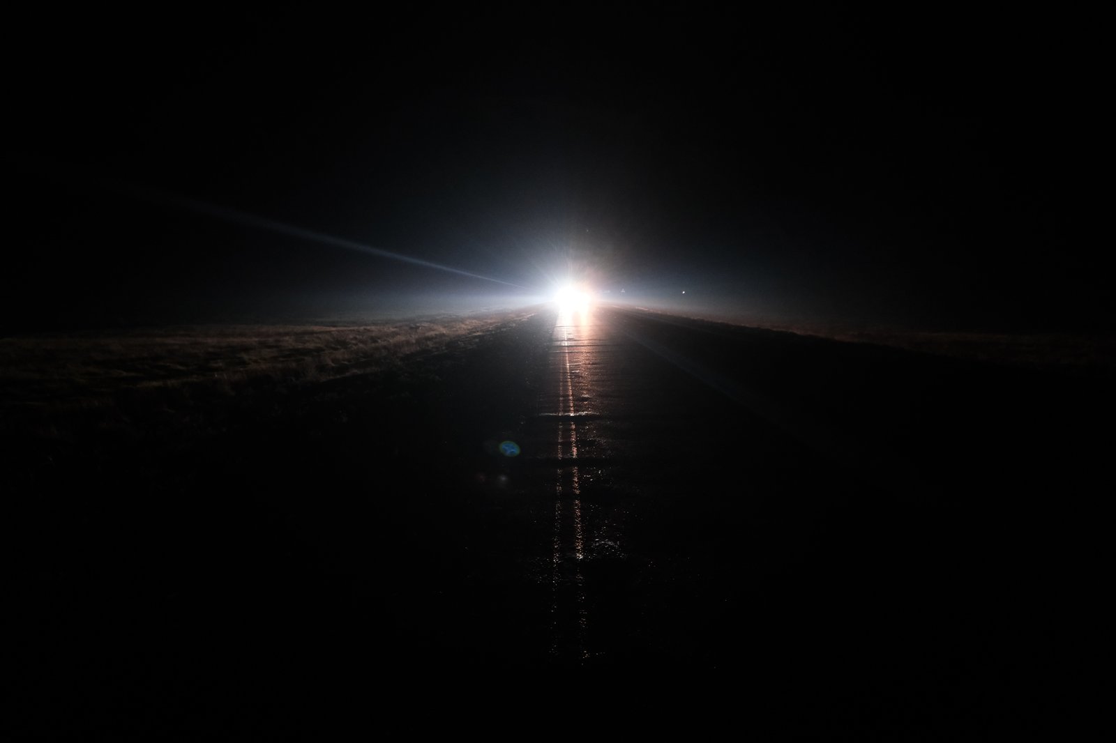 Blinding headlights were a regular feature of my night walks across Russia.